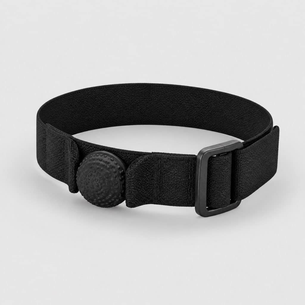 Bracelet d'acupression noir réglable posé à plat sur fond clair
