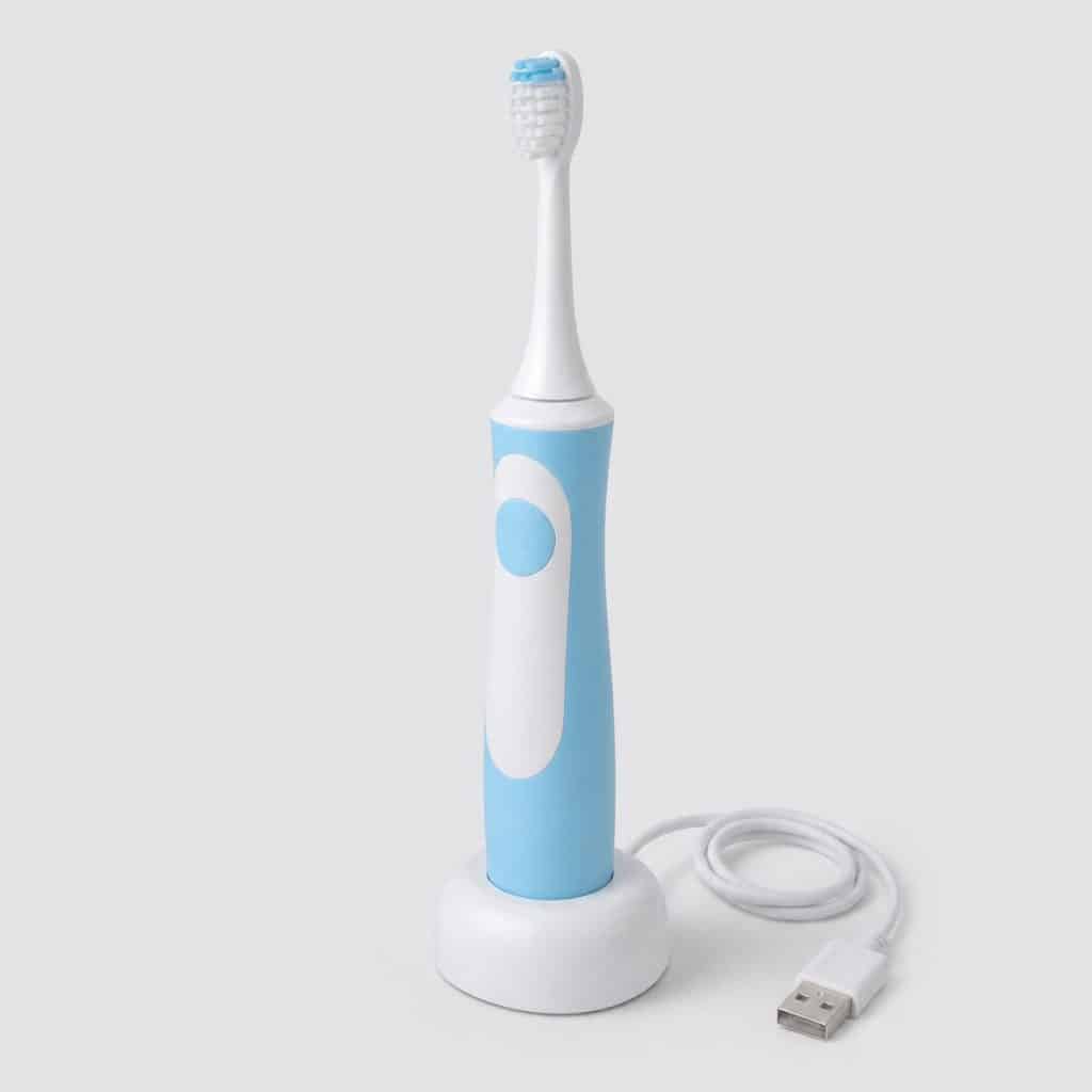 Brosse à dent électrique junior avec son chargeur