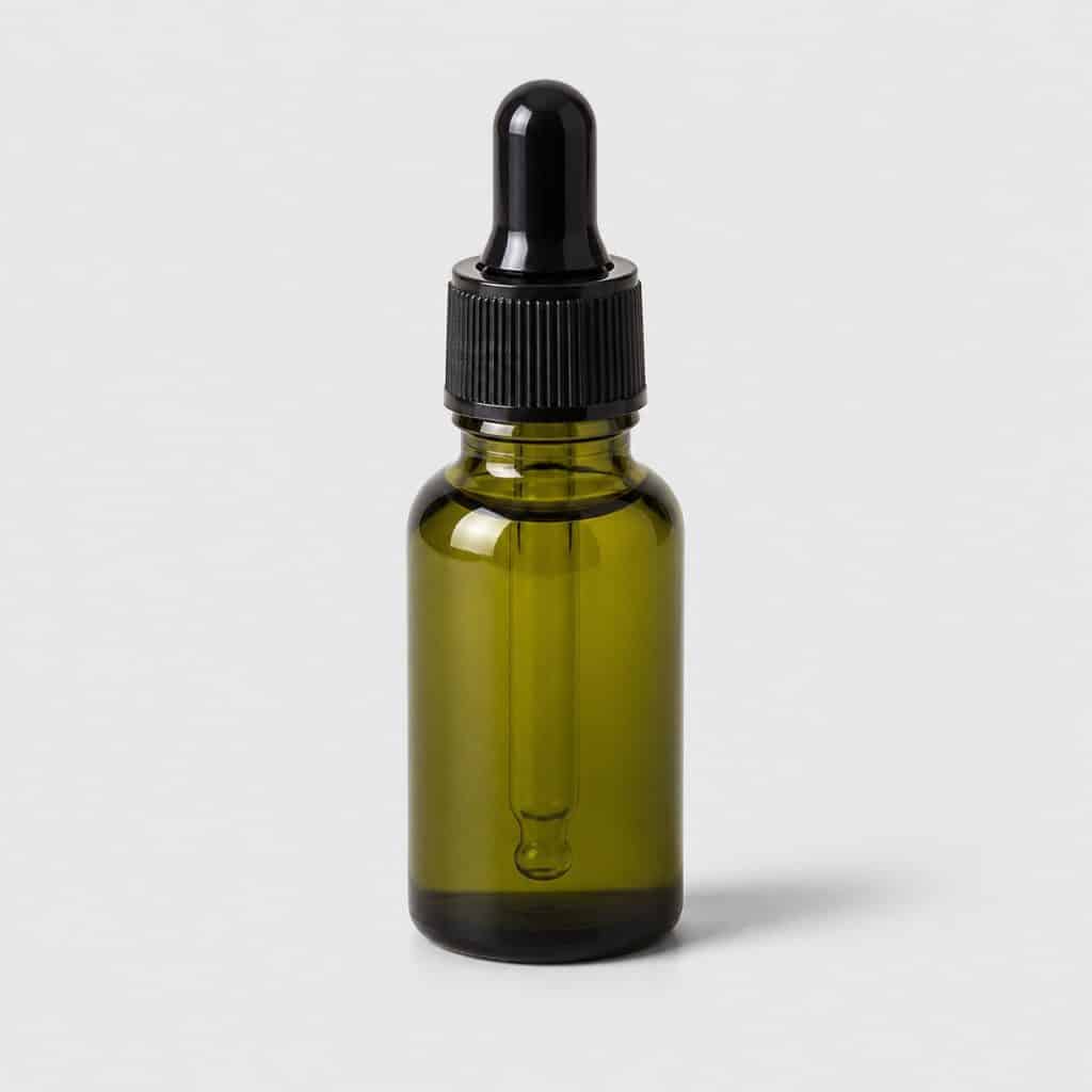 Flacon d'huile essentielle de menthe poivrée avec bouchon compte-gouttes