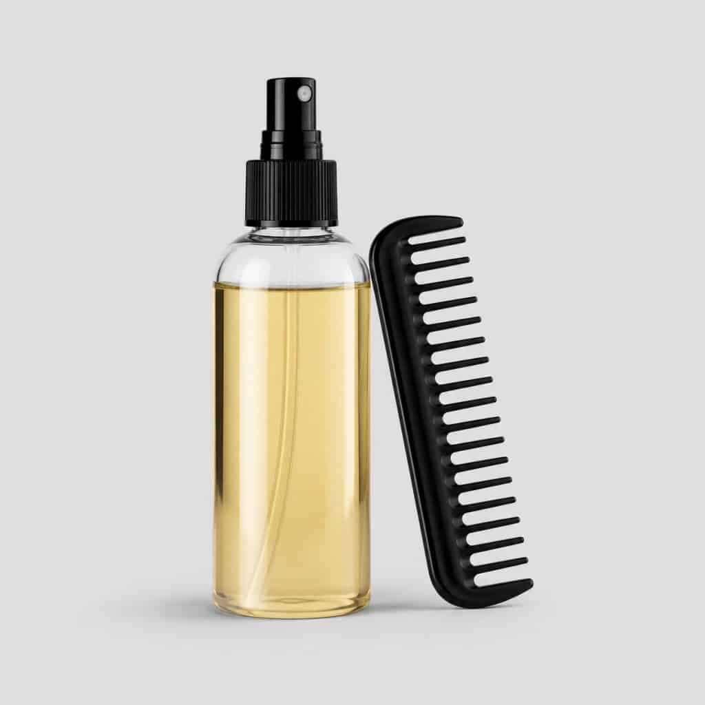 Flacon de lotion anti-poux vendu avec son peigne