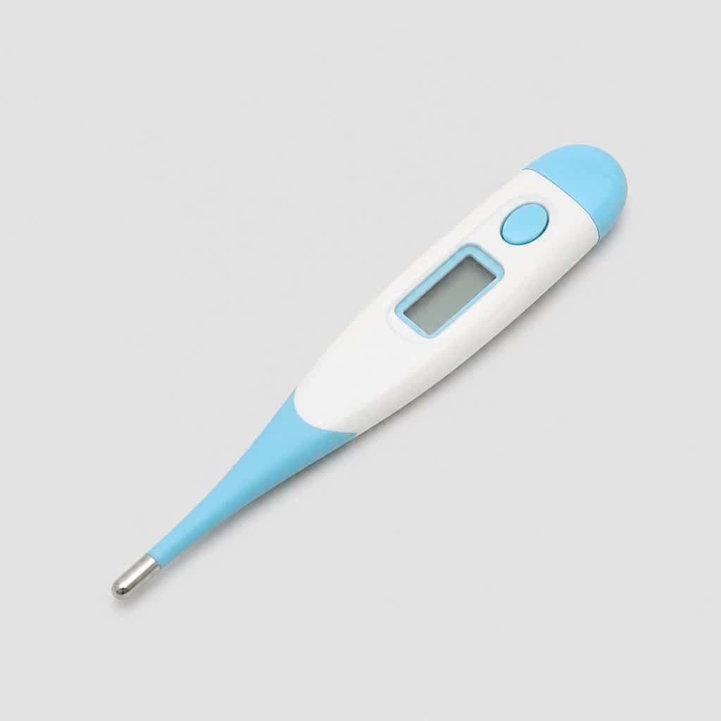 Thermomètre digital blanc et bleu à embout souple posé à plat